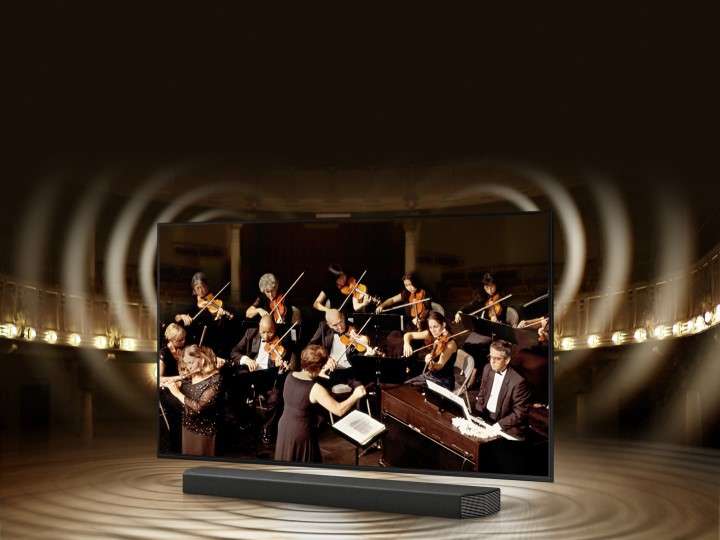 Đồ họa sóng âm thanh mô phỏng từ TV và loa thanh thể hiện công nghệ Q Symphony khi chúng phát âm thanh cùng nhau.